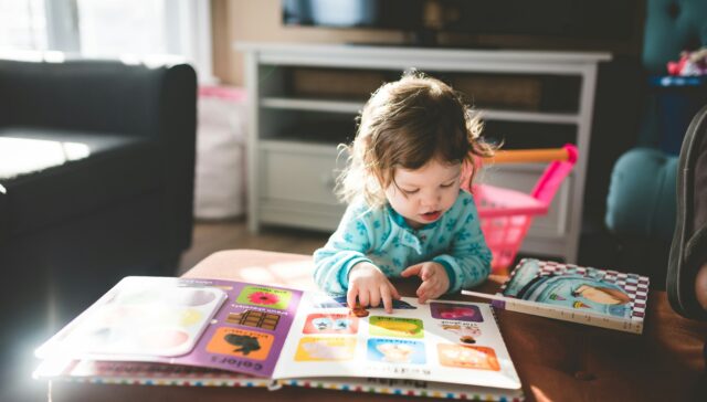 child reading book